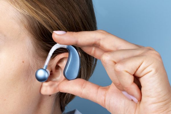 side-view-woman-wearing-hearing-aids